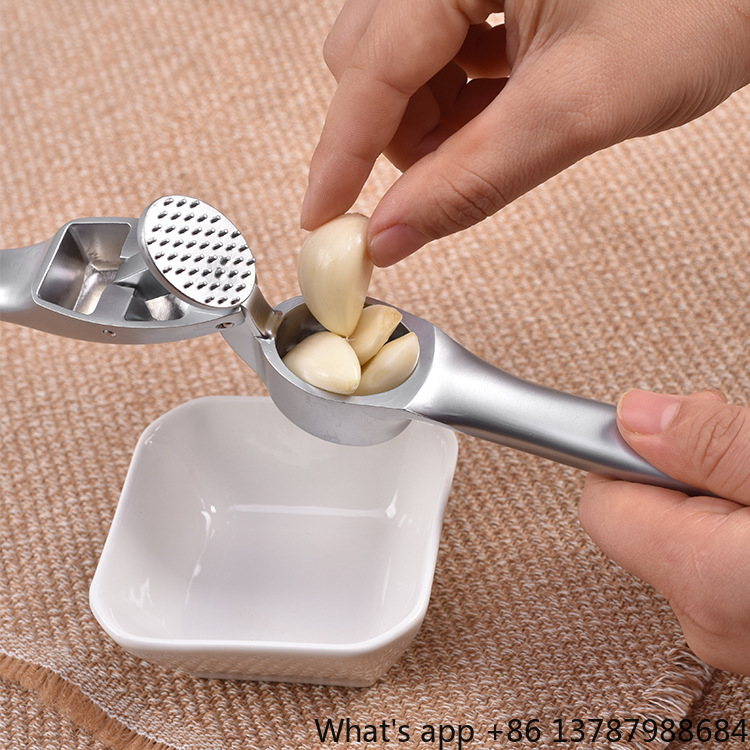عصارة ثوم يدوية من سبيكة الزنك - مراجعة Kitchen Hand Gadgets وسعره