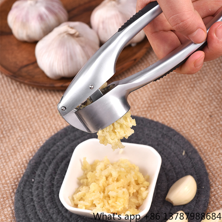 عصارة ثوم يدوية من سبيكة الزنك - مراجعة Kitchen Hand Gadgets وسعره